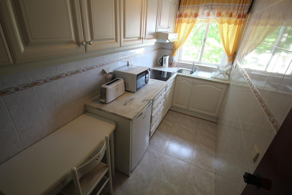 Hospedaria Buganvilia Alvor Rom bilde